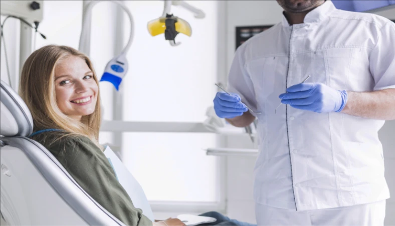 Smiling patient after successful dental implant procedure